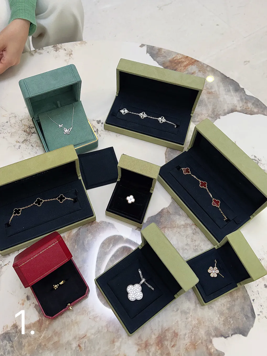 Fine jewelry pieces presented in gift boxes